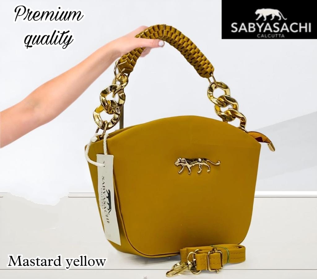 Regal Radiance: Sabyasachi Sling Bag with Weaved Handle